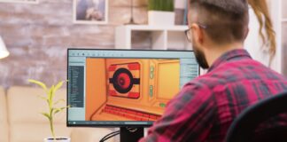 What makes a game launch successful? A person sitting at a table looking at a computer screen Description automatically generated with medium confidence