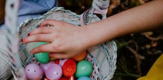 How to plan an egg scavenger hunt in a small apartment? person holding a basket of easter eggs