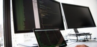 Infrastructure as Code Security Guide shallow focus photo of person using MacBook