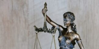 Why Should You Always Seek Legal Advice? woman holding sword statue during daytime