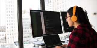 How to Become a Better Software Developer: Practical Tips to Help shallow focus photo of woman using laptop computer