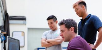 Virtual Sport: How to Bet on Virtual Events man in maroon long sleeve shirt holding a book