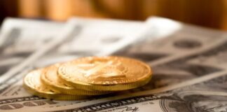 How Do Banks Take Advantage of Bitcoin? three round gold-colored coins on 100 US dollar banknotes