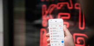 Mistakes to Avoid to Stop Phone Scams person holding white samsung galaxys 4