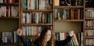 How to Juggle Homework and Stay Sane? woman in black long sleeve shirt sitting in front of silver macbook