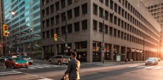 What You Need If Working on Your Feet All Day man crossing pedestrian lane