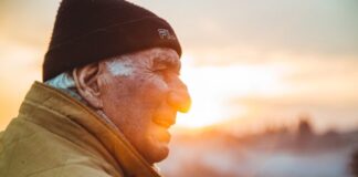 Aged Care Home: How To Move A Parent With Dementia man wearing brown jacket and knit cap