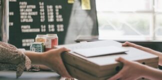 How To Move Forward Following a Wrongful Termination person holding white printer paper