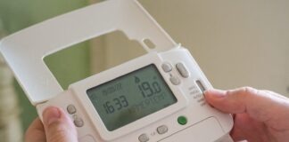 IPTV – Best IPTV Provider a person holding a device