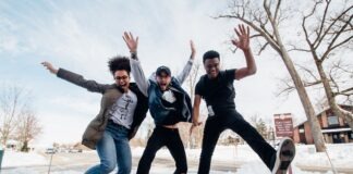 How Students Can Apply Gaming Strategies to Problem-Solving photo of three men jumping on ground near bare trees during daytime