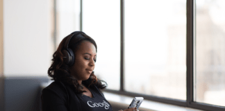 How Do I Scrape Google Without Getting Banned? a person holding a phone