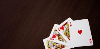 Gaming for Gains: A Look at Casino Adventures in the Gaming World Ace, King, Jack, and King of Hearts Playing Cards
