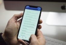 Turning Criticism into Triumph: Uncovering the Importance of Responding to Negative Comments person using phone