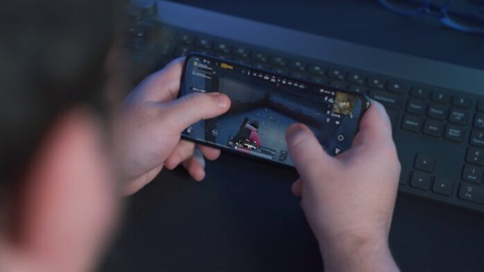 Photo by Onur Binay person holding black samsung android smartphone