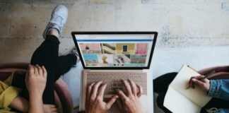 Why Personalized Marketing Campaigns Drive Better Engagement person using microsoft surface laptop on lap with two other people