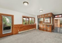 5 Tips for Investing in Rental Properties Empty Rustic Dining Room with Cocktail Bar Counter