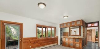 5 Tips for Investing in Rental Properties Empty Rustic Dining Room with Cocktail Bar Counter