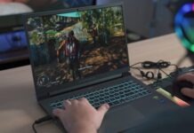 Lightweight Powerhouses: The Best Thin Gaming Laptops a person playing a video game on a laptop