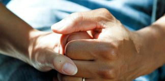 How to Help a Loved One Who is Injured person wearing gold wedding band