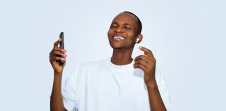 Why Rust Gambling Isn’t ‘Real’ Gambling – And Why It’s Exploding in Popularity a person holding a phone