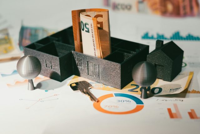 Photo by Jakub Żerdzicki A couple of keys are sitting in a holder